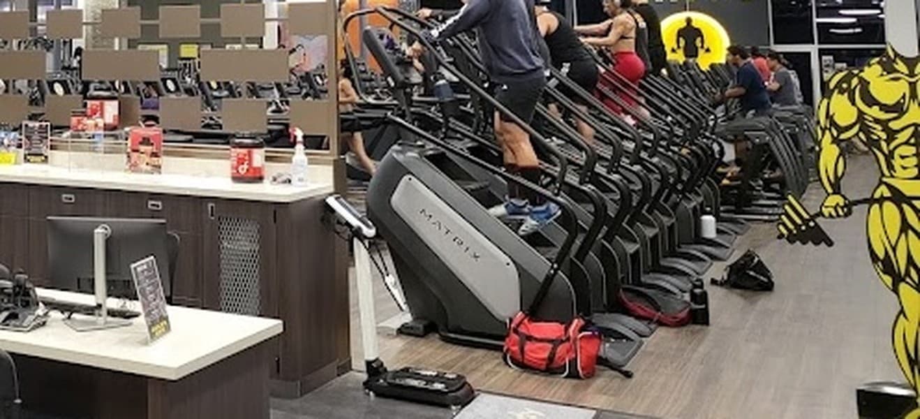 Underutilized InBody analyzer beside stair climbers in a Southern California gym